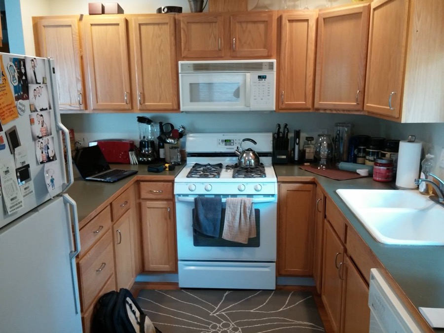 Before: Original kitchen with white cabinets
